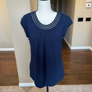 Dark blue blouse with design on collar